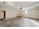 Bright garage with door, ramp, and window at 405 Lookout Pt, Rougemont, NC 27572