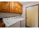 Laundry room including a washer, dryer, and lots of cabinet space at 405 Lookout Pt, Rougemont, NC 27572