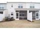 Cozy back porch with screened-in area and ample space for outdoor relaxation at 5006 Tura St, Raleigh, NC 27610