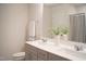 Bathroom featuring a dual sink vanity and neutral decor at 5006 Tura St, Raleigh, NC 27610
