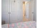 Bright bedroom featuring double closets and neutral decor at 5006 Tura St, Raleigh, NC 27610
