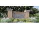 Elegant brick community sign at Trace at Olde Towne with decorative landscaping at 5006 Tura St, Raleigh, NC 27610