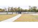 Community dog park with fenced areas for pets to roam and play freely at 5006 Tura St, Raleigh, NC 27610