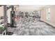 Modern gym with state-of-the-art equipment and mirrored walls for fitness enthusiasts at 5006 Tura St, Raleigh, NC 27610