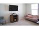 Flex room with space for a television, printer, and comfortable seating options at 5006 Tura St, Raleigh, NC 27610