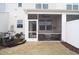 View of the screened-in porch featuring outdoor seating at 5006 Tura St, Raleigh, NC 27610