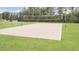 Enjoy a fun game of volleyball on this sandy court surrounded by lush green lawns and trees at 5006 Tura St, Raleigh, NC 27610