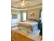 Spacious main bedroom featuring tray ceilings, neutral paint, and soft natural light at 528 Opposition Way Way, Wake Forest, NC 27587
