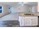 Open living room concept offering seamless transition from kitchen island to expansive living space with natural light at 737 Little Patch St, Zebulon, NC 27597