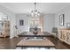 Inviting dining area with hardwood floors, bench seating, and stylish decor at 7520 Channery Way, Raleigh, NC 27616