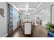 Bright dining room featuring modern lighting, elegant decor, and hardwood floors at 7520 Channery Way, Raleigh, NC 27616