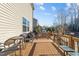 Spacious wooden deck with outdoor kitchen, grill, and seating area at 7520 Channery Way, Raleigh, NC 27616
