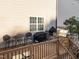 A cozy outdoor patio with grilling area, perfect for entertaining and relaxation in the backyard of your new home at 7520 Channery Way, Raleigh, NC 27616