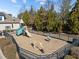 Community playground with swings, slide, and climbing features, providing a safe and fun recreational area for families at 7520 Channery Way, Raleigh, NC 27616