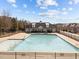 A large, inviting community pool offers residents a refreshing escape and a place to relax during warm weather at 7520 Channery Way, Raleigh, NC 27616