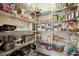 Walk-in pantry with wire shelving and organized storage containers at 86 Cecina Ct, Clayton, NC 27527