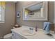 Bathroom with vanity and white countertop at 8617 Canoe Ct, Raleigh, NC 27615
