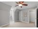 Bedroom featuring neutral paint, carpet and a lighted ceiling fan at 8617 Canoe Ct, Raleigh, NC 27615