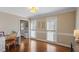 Home office features hardwood floors, neutral colors, crown molding, and bright natural light at 8617 Canoe Ct, Raleigh, NC 27615