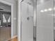 Bathroom shower featuring white subway tile and modern fixtures at 8617 Canoe Ct, Raleigh, NC 27615