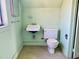 This is a picture of the attic bathroom with sink and toilet at 1006 Stallings Rd, Durham, NC 27703