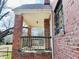 Detail of brickwork on a covered porch, showcasing the home's architectural design and exterior features at 1006 Stallings Rd, Durham, NC 27703
