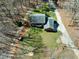 Bird's eye view of a home surrounded by a lush yard, trees and a long driveway at 1013 Traders Trl, Wake Forest, NC 27587