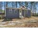 Cozy one-story home with neutral siding, a small front porch, and a well-kept yard at 1013 Traders Trl, Wake Forest, NC 27587