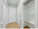 Hallway with closet, light grey walls, and light hardwood flooring at 1013 Traders Trl, Wake Forest, NC 27587