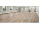 Bright living room featuring beautiful floors, modern windows and an open space design at 1013 Traders Trl, Wake Forest, NC 27587