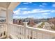 A peaceful balcony view of the complex and a blue cloudy sky at 10510 Sablewood Dr # 108, Raleigh, NC 27617