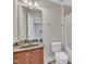 Well-maintained bathroom with granite counters and a shower-tub combo at 10510 Sablewood Dr # 108, Raleigh, NC 27617