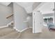 Hallway with stairs and doorway to a room with a bed and natural lighting at 10510 Sablewood Dr # 108, Raleigh, NC 27617