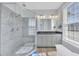 Main bathroom featuring a glass shower and a double vanity with granite countertops at 10510 Sablewood Dr # 108, Raleigh, NC 27617
