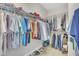 Organized walk-in closet with wire shelving and ample storage space for clothes and shoes at 10510 Sablewood Dr # 108, Raleigh, NC 27617