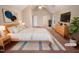 This spacious main bedroom is virtually staged with nice decor and a vaulted ceiling at 110 Chickasaw Cir, Clayton, NC 27527