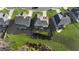 An aerial view of the property shows well-maintained landscaping and neighboring homes at 112 Ava Ct, Holly Springs, NC 27540