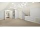 Large carpeted attic with skylight, built-in closet and ceiling fan at 113 Preston Pines Dr, Cary, NC 27513
