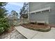 Backyard garden showcasing raised planters and landscaping, offering a serene and private outdoor space at 113 Preston Pines Dr, Cary, NC 27513
