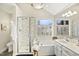 Relaxing bathroom with a soaking tub, a walk-in shower, and dual vanity sinks at 113 Preston Pines Dr, Cary, NC 27513