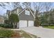 Spacious two-car garage with ample parking and well-maintained exterior at 113 Preston Pines Dr, Cary, NC 27513
