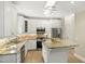 Well-equipped kitchen featuring stainless steel appliances, an island, and ample counter space at 113 Preston Pines Dr, Cary, NC 27513