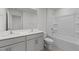 Bathroom featuring dual sinks, a shower, and a bathtub for a spa-like experience at home at 117 Pisgah St, Sanford, NC 27330