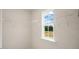 Walk in closet featuring custom shelving and a window for natural light at 120 Pisgah St, Sanford, NC 27330