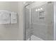 Modern walk-in shower with sleek glass doors and tiled walls at 1257 S Blount Street # 201, Raleigh, NC 27601