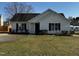 Charming one-story home featuring well-manicured lawn and classic curb appeal at 128 Glengariff Ln, Clayton, NC 27520