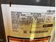 Image of the HVAC unit label showing the model and manufacturing information at 128 Glengariff Ln, Clayton, NC 27520