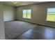 Spacious living room with a combination of carpet and hardwood flooring and bright natural light at 131 E Victory View. Ter, Smithfield, NC 27577