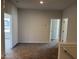 Open loft area with carpeted flooring, neutral walls, and natural light at 131 E Victory View. Ter, Smithfield, NC 27577