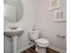 Clean and simple powder room with pedestal sink, toilet, and modern fixtures at 131 E Victory View. Ter, Smithfield, NC 27577
